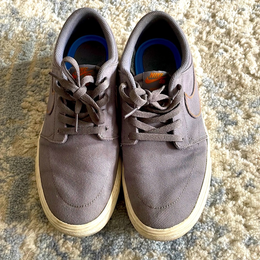 Women’s Nike SB gray and orange shoes